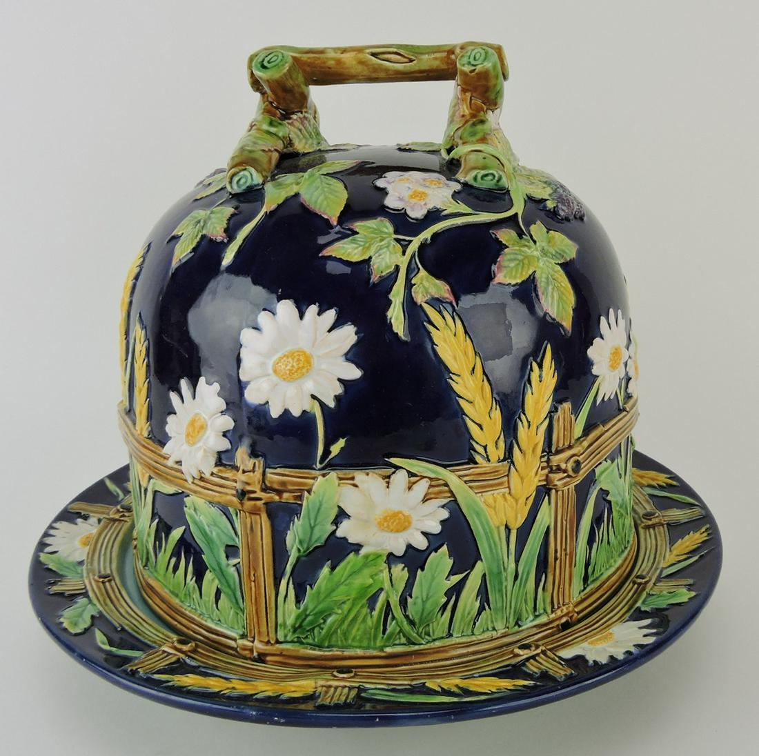 George Jones majolica cobalt picket: fence and daisy cheese keeper, 10", crack to cover