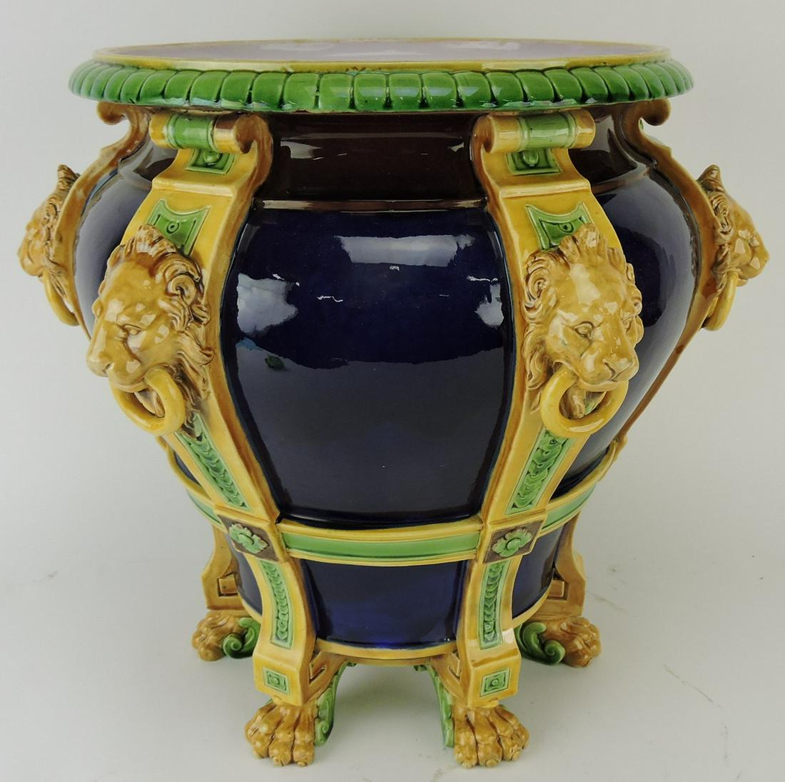 Minton majolica cobalt jardiniere: with lion masks, paw feeet and straps, 14"