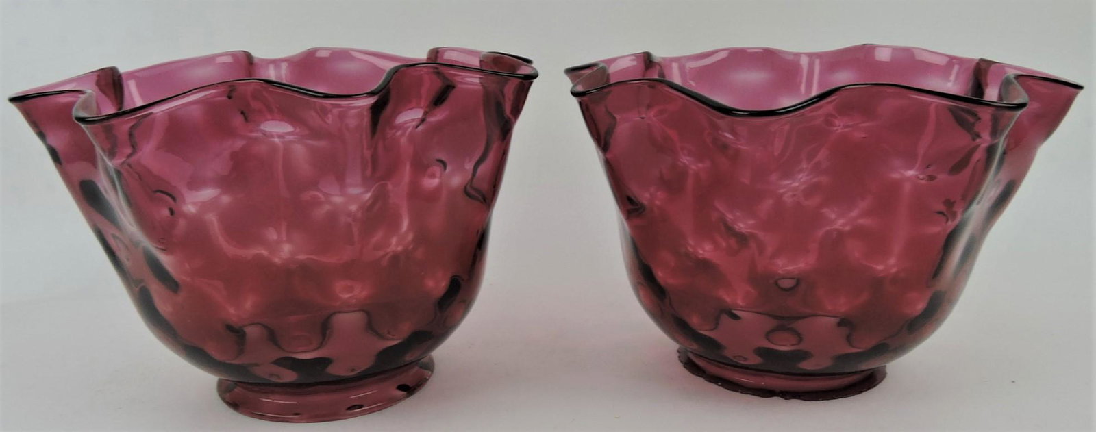 Pair of cranberry thumbprint lamp: shades, 6"h, 4" fitter (chip to fitter ring)