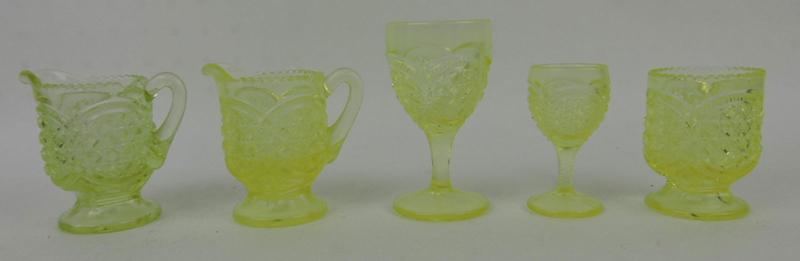 Greentown vaseline Austrian lot of: 5 pieces: 2 - 3 1/4" creamers, 4" & 3" cordial, toothpick holder