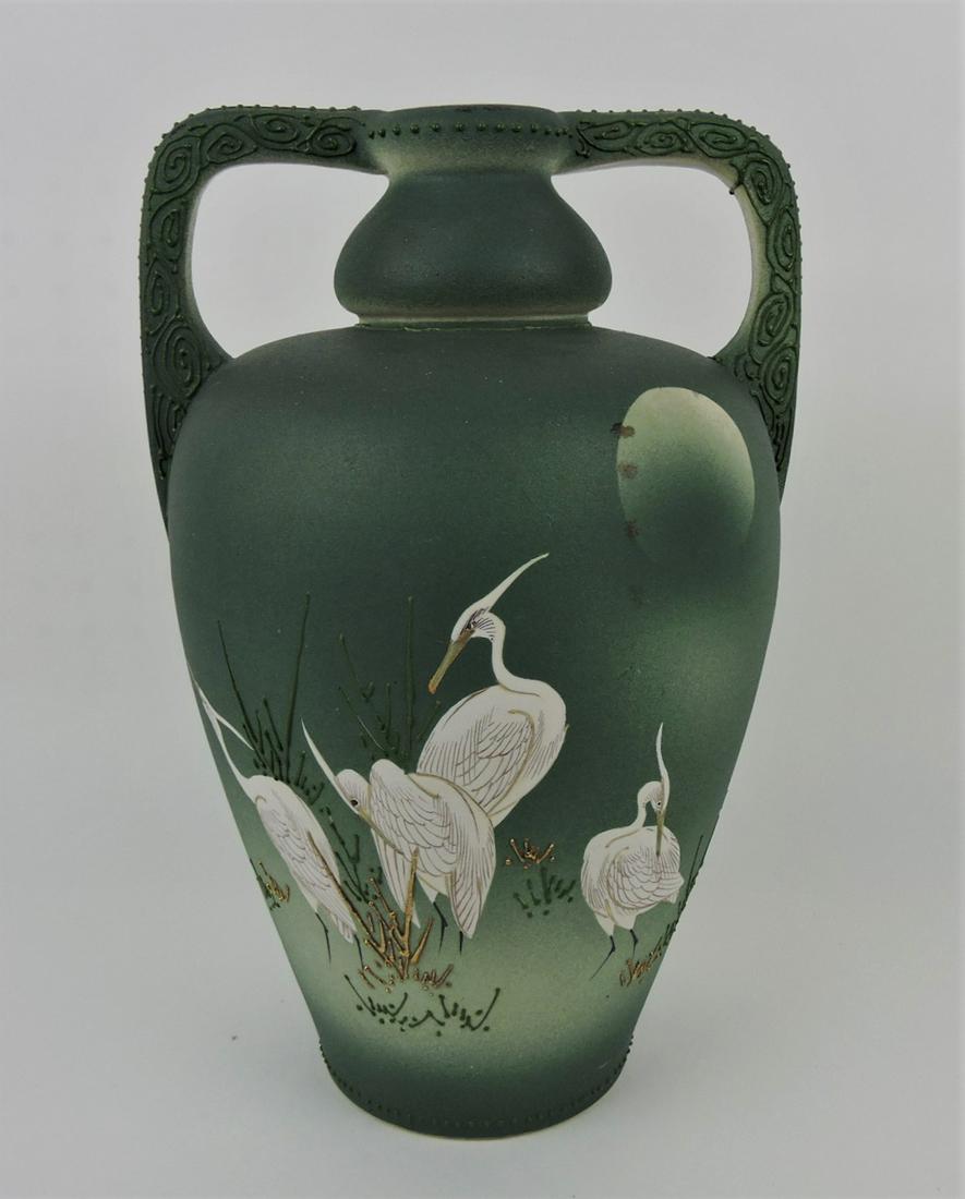 Oriental two handled vase with storks (1 of 2)