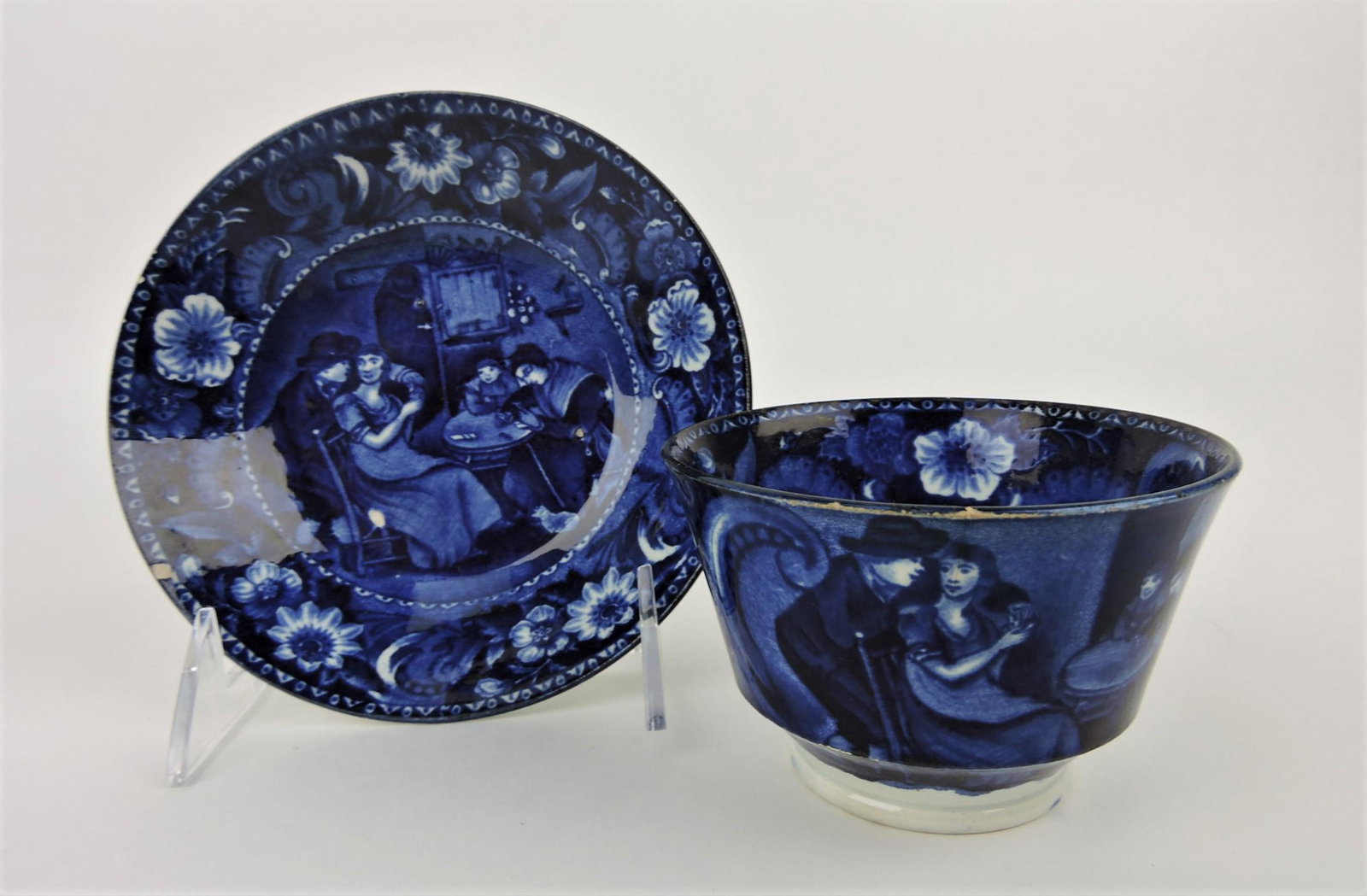 Clews blue and white Staffordshire: "Christmas Eve" cup and saucer, rim wear to cup, rim nick to saucer