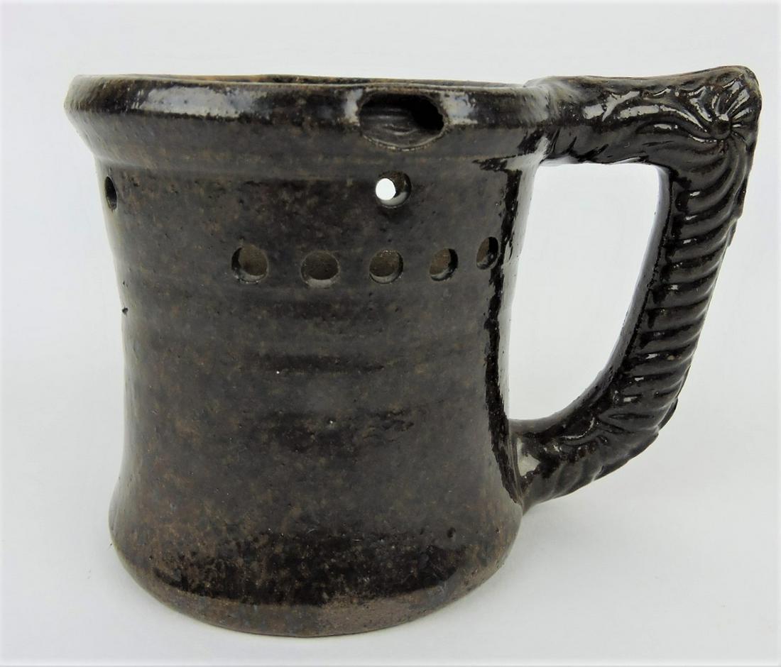 George Ohr pottery puzzle mug with (1 of 2)
