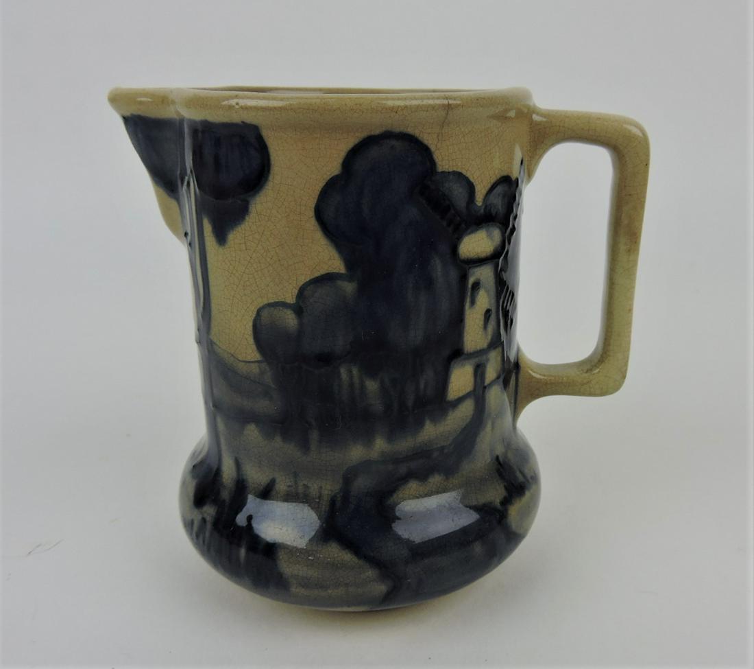 Rhead Faience creamer, 4 1/2", signed,: hairline