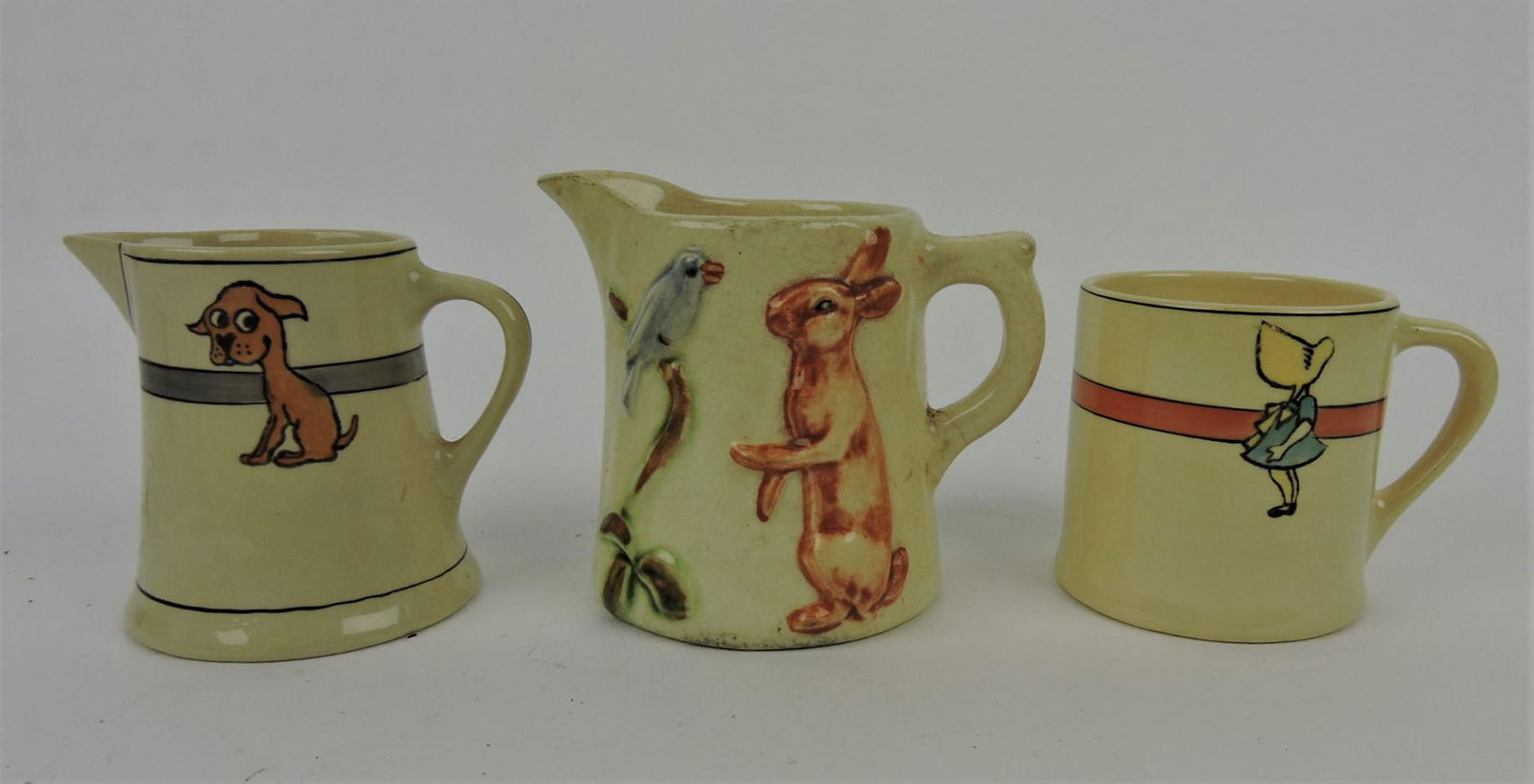 Weller and Roseville lot of 3: juvenile creamers and mug