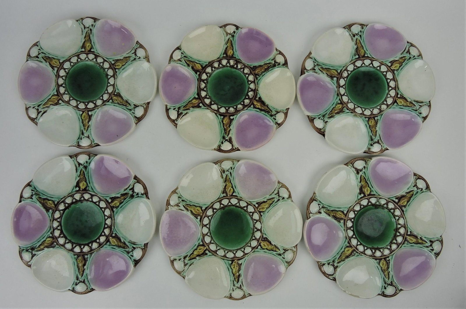 Majolica set of 6 - 9 1/4" six well oyster: plates, alternating pink and white wells, minor rim wear