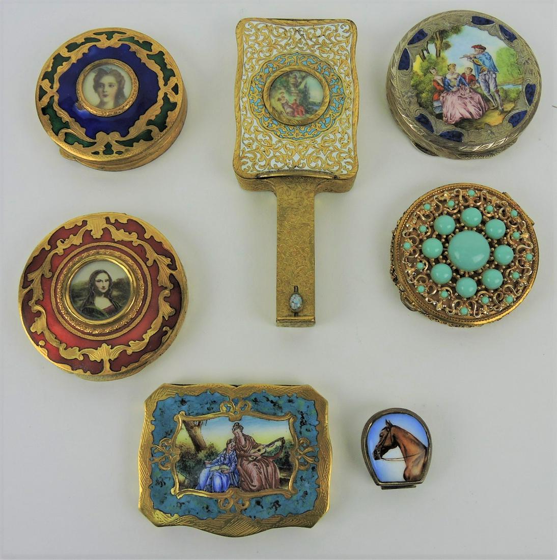 Lot of 7 ladies compacts with enameling,: largest 5 1/2", smallest 1 1/4"
