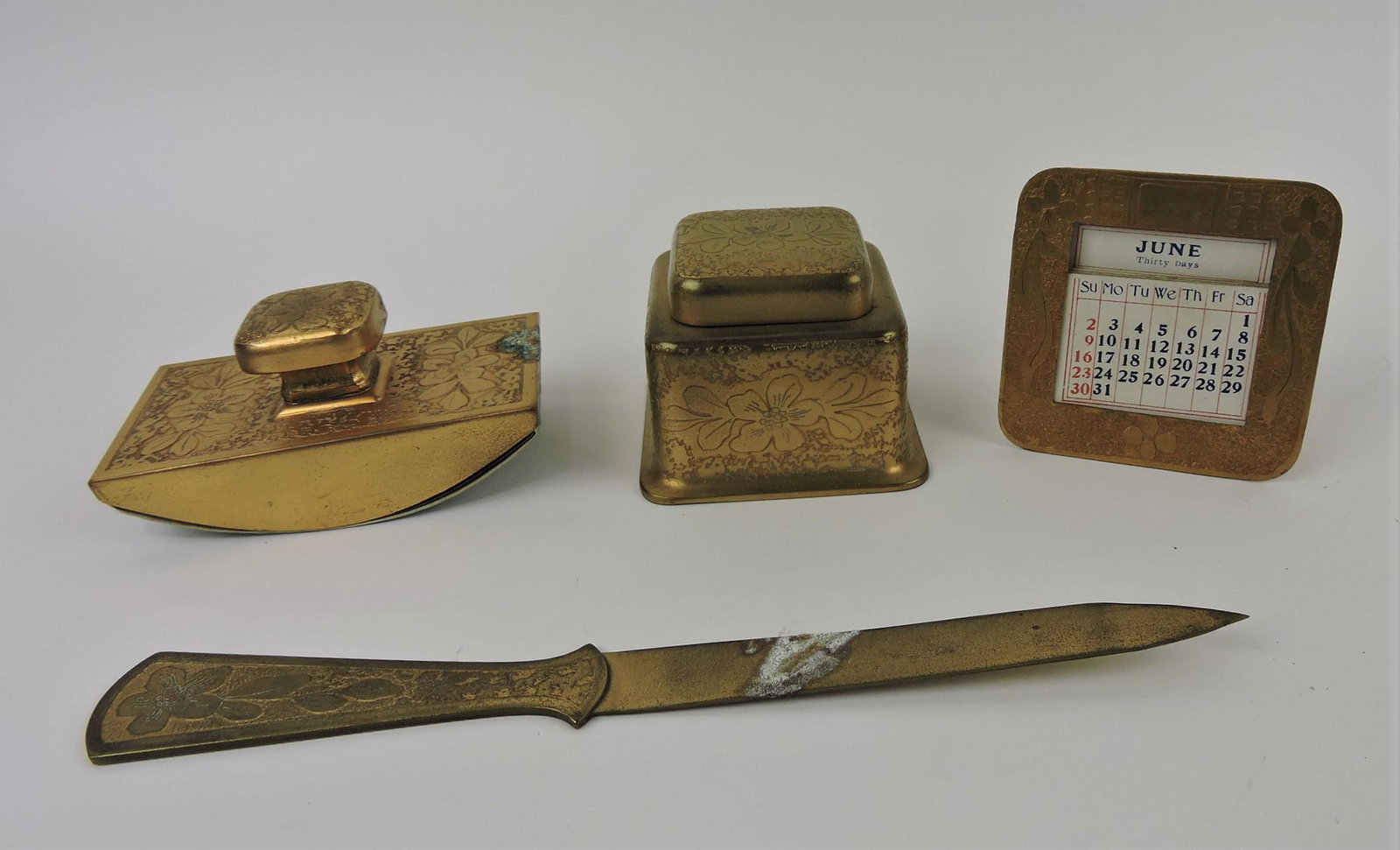 Brass arts and crafts 4 piece desk: set with inkwell, rocker sealer, calendar, letter opener