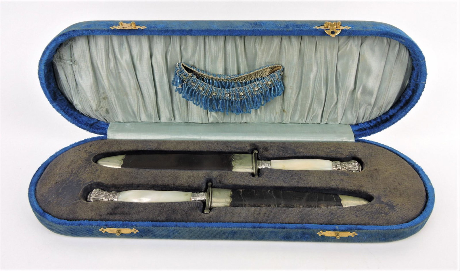 James Rodgers Royal Cutlery Sheffield: pair of rare "Bowie" knives with leather scabbards and presentation case, MOP grips and silver ormolu, 11 3/4"l