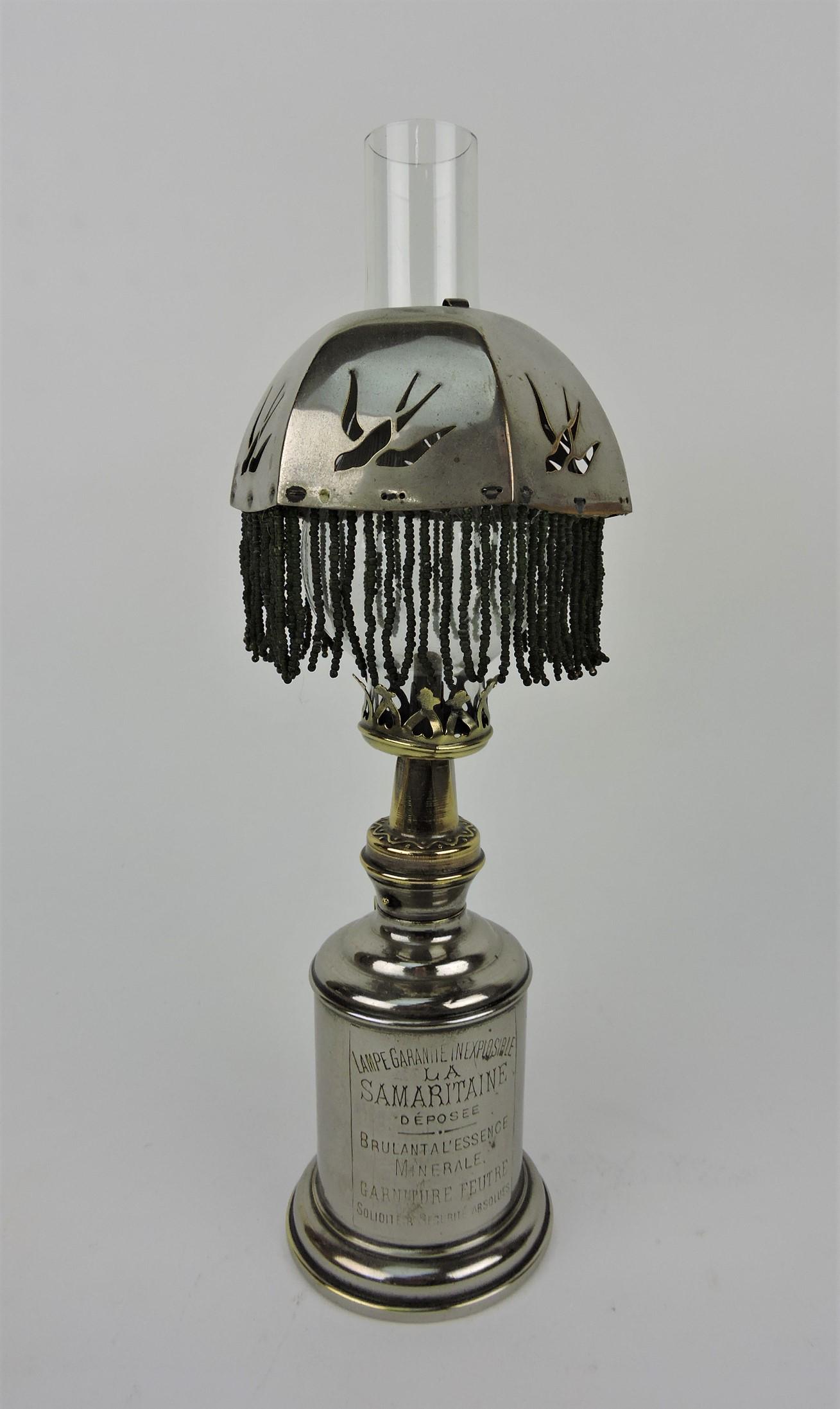 French nickel over brass lamp with shade,: Lampe Granite Inexplosible La Samaritaine", 12