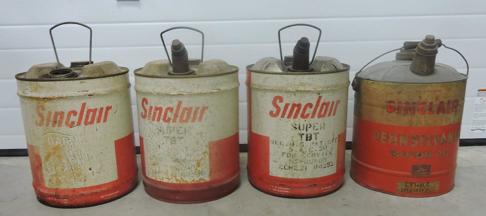 Sinclair lot of 4 - 5 gallon oil/fuel cans (1 of 1)