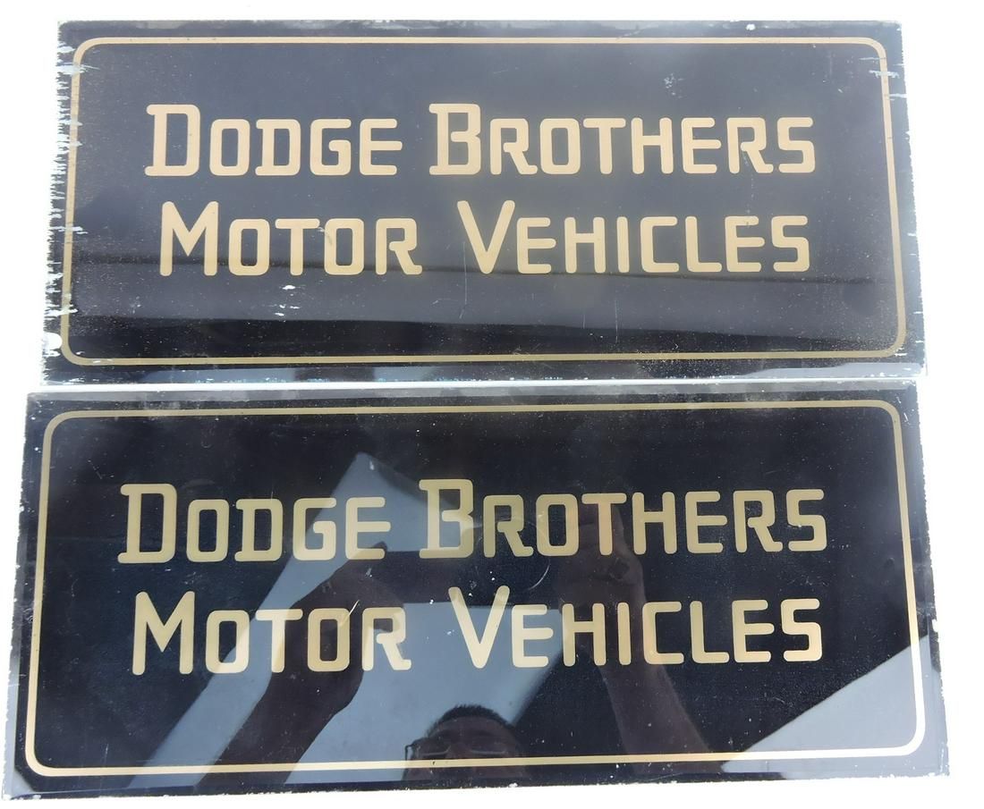 2 - glass reverse lettered signs: "Dodge (1 of 1)