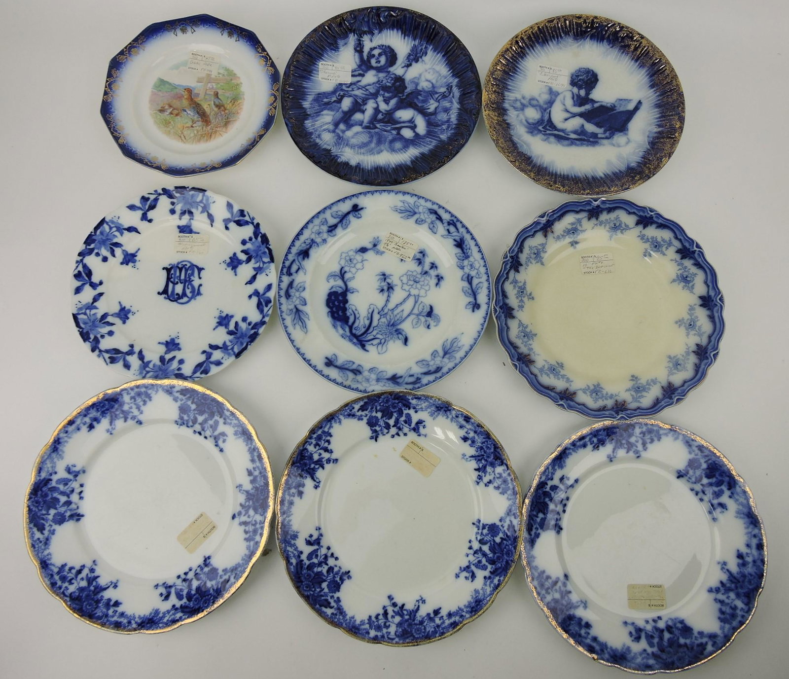 Flow Blue lot of 9 plates with Oriental: motif, various condition