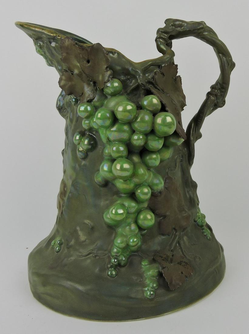 Amphora style Vienna porcelain pitcher: with grapes, some losses, 10 1/2"
