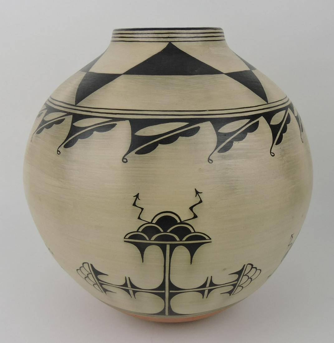 Lisa Holt (Conchita Pueblo) and Harlan: Reano (Santa Domingo Pueblo) large jar with Conchita rain design, 12"w, 14"h