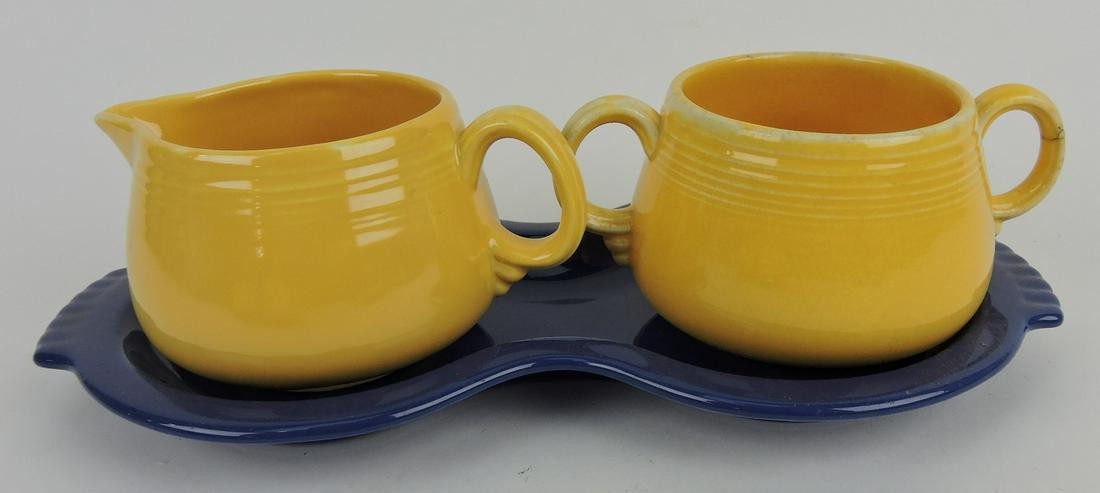 Fiesta cream/sugar set with cobalt figure 8: tray, yellow creamer & sugar, no lid, hairline to sugar handle