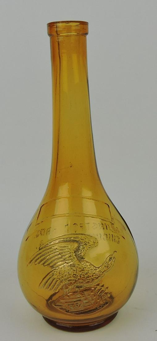 Rheinstrom Bros. Cincinnati, OH eagle: amber bottle, 8 1/2"