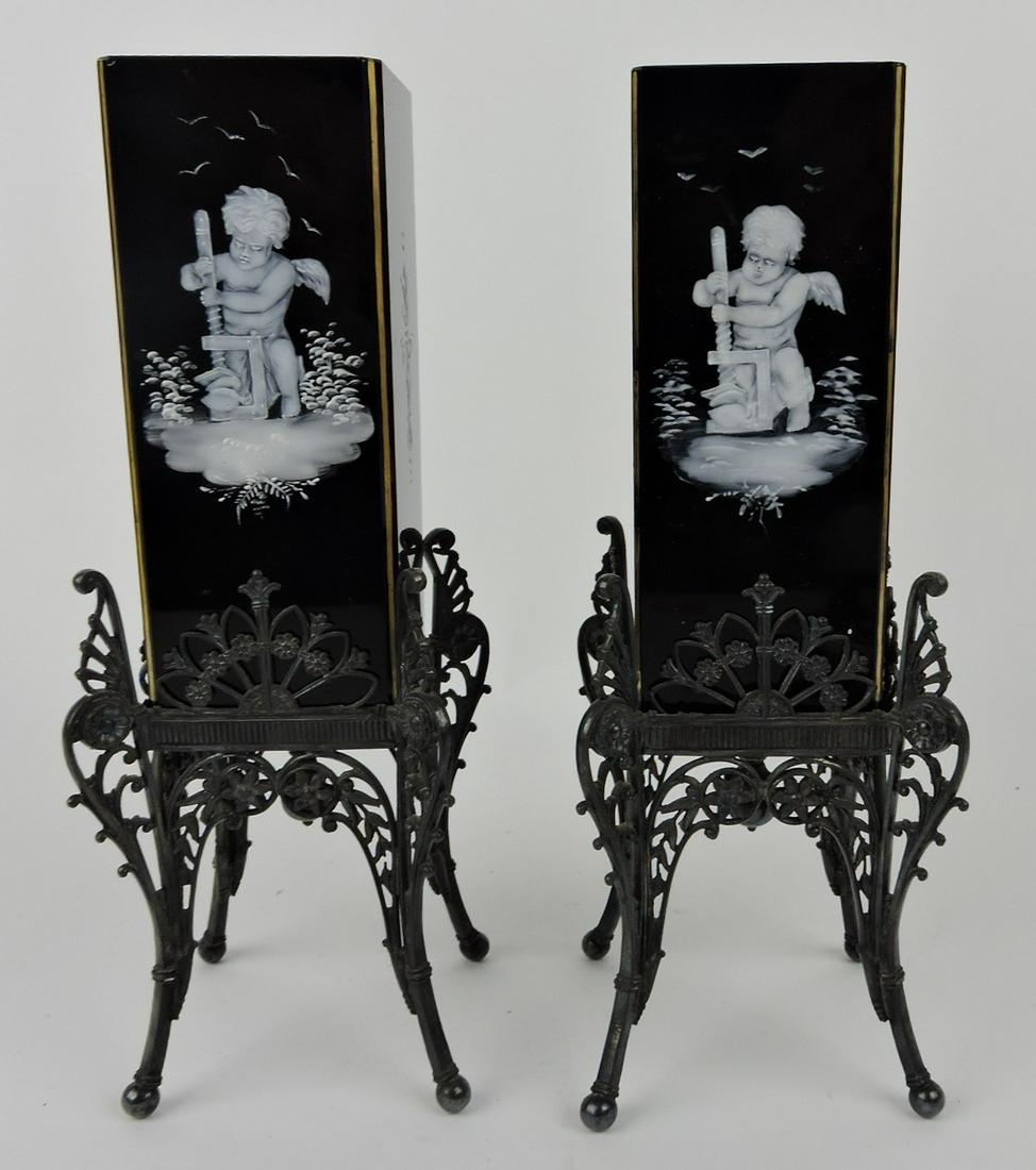 Victorian pair of black amethyst mantle: vases, Mary Gregory decor, Tufts silver plate holders, some losses to holder, 10 1/2"