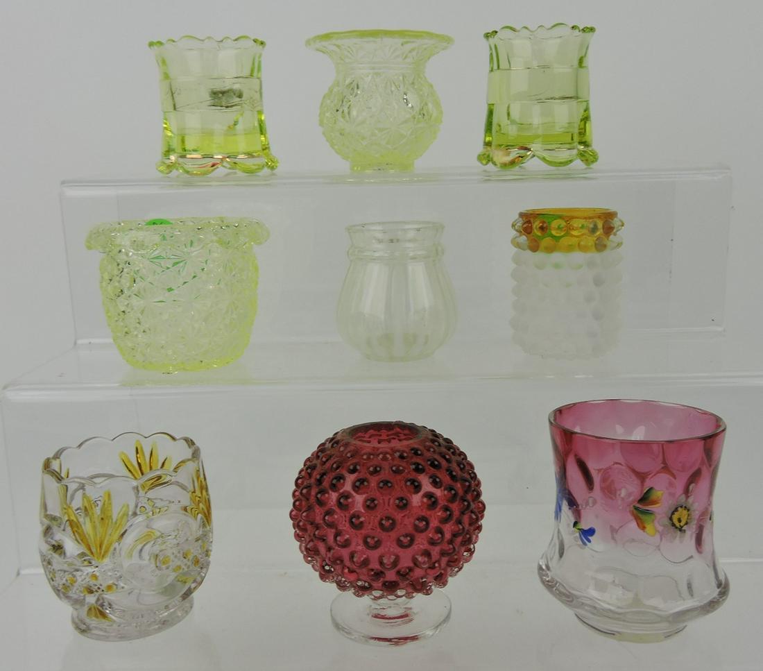 Toothpick holder lot of 9: 2 - Vaseline: Riverside Ransom, Vaseline Daisy & Button spittoon, Vaseline Daisy & Button with rolled edge, opalescent stripe, Hobbs Franciscanware, Scroll amber stained, cranberry footed hobnail, Rubina floral
