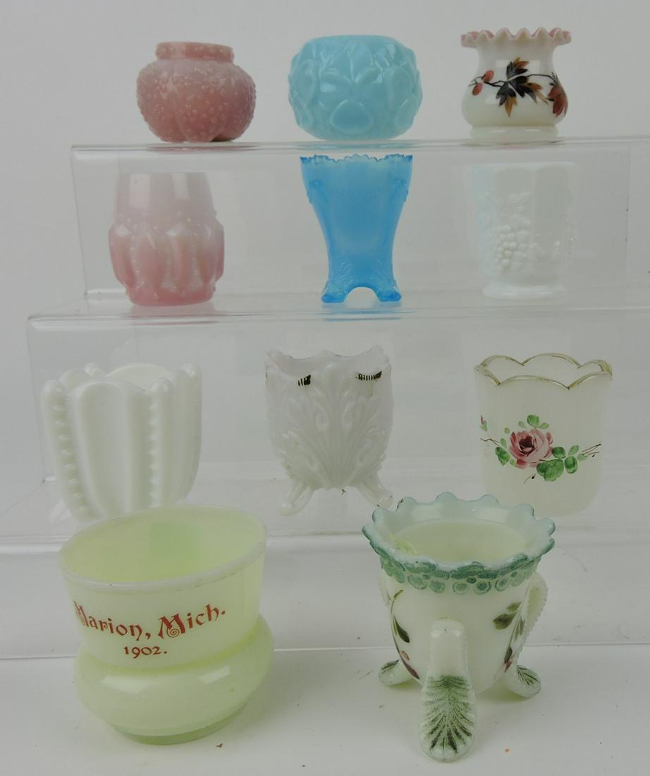 Toothpick holder lot of 11: pink Forget Me: Not, blue Pansy, ruffled overlay, peachblow, blue swag with brackets, Westmoreland paneled grape, footed leaf, and others