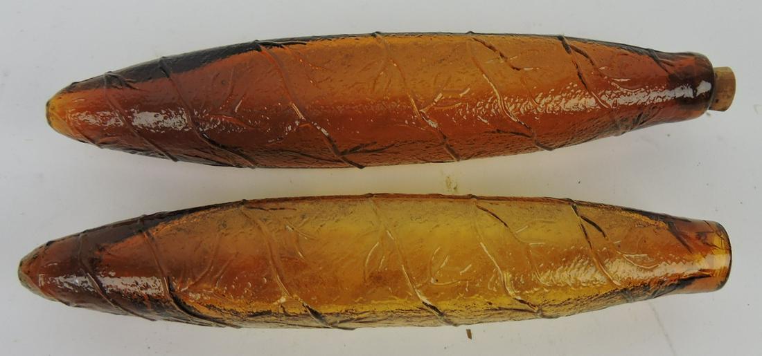 Pair of amber glass cigar flasks, 5 1/4": .