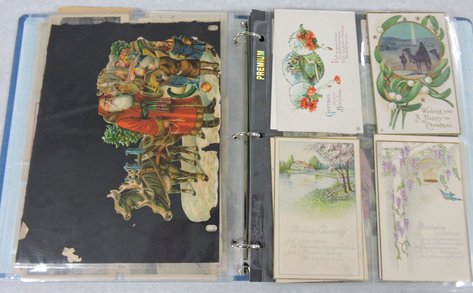 Postcard and ephemera album: .