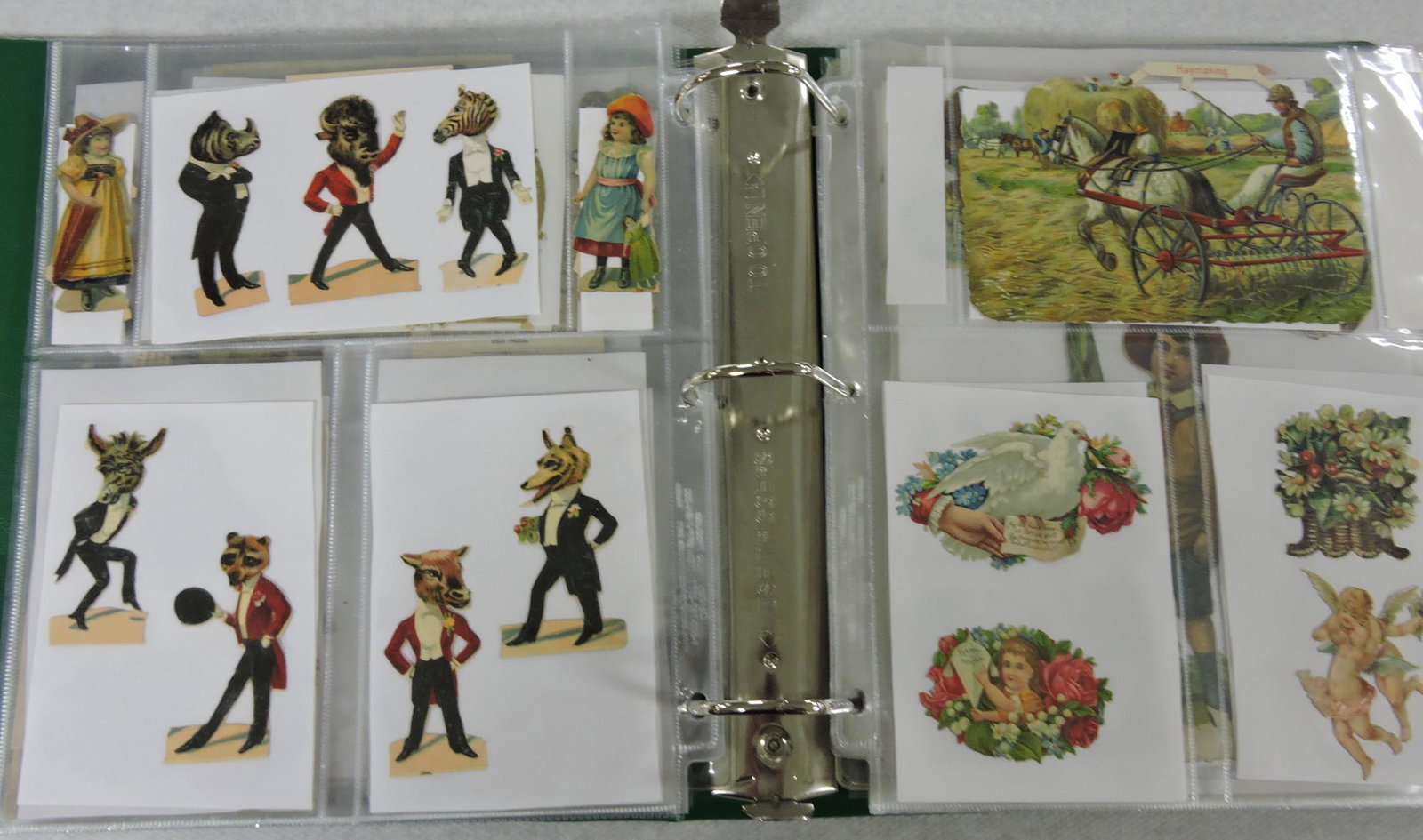 Album of Victorian die cut and ephemera: .