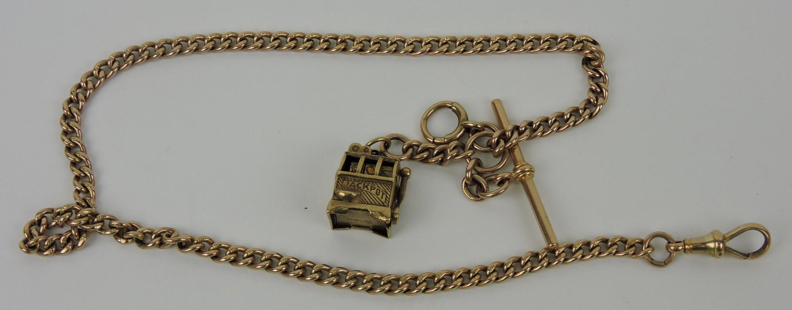 9kt yg men's pocketwatch chain and: slot machine (9kt) fob, 39.4g