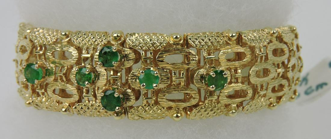 Lady's 14kt and emerald bracelet, 43.3g: .