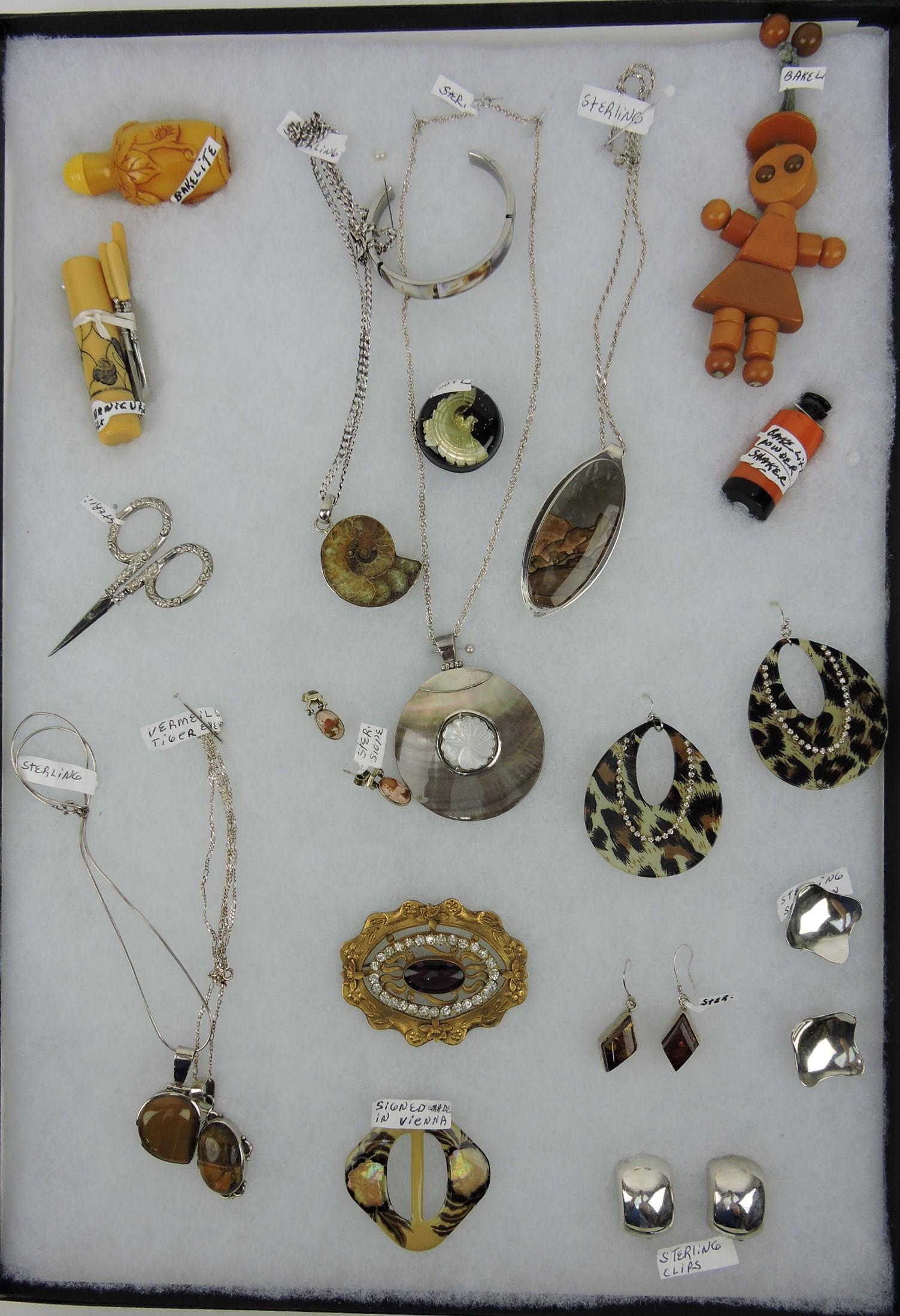Tray of jewelry - Bakelite, sterling,: costume, tiger eye, and more