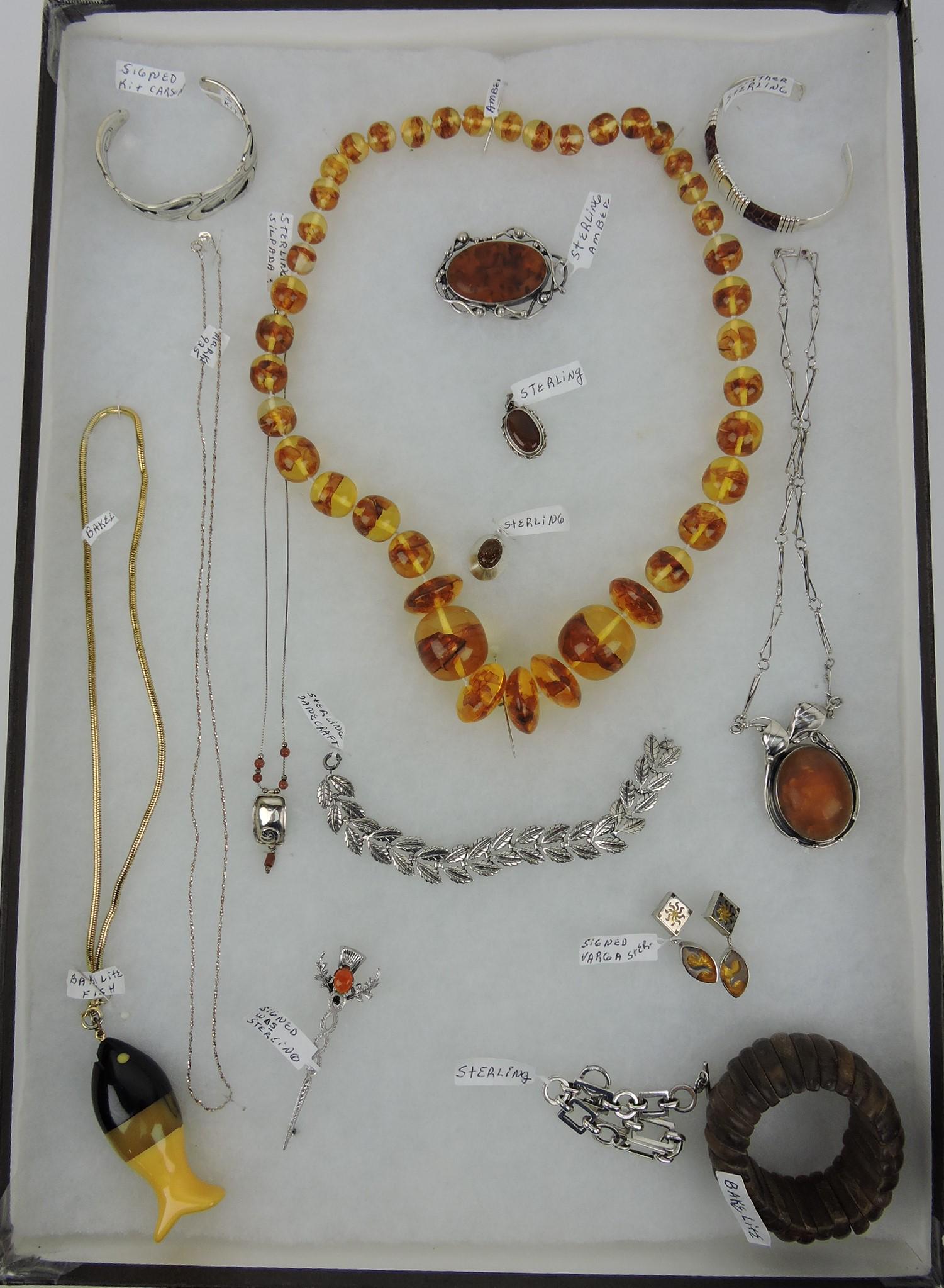 Sterling silver and amber tray of: jewelry - large beaded amber necklace, Bakelite fish necklace and stretch bracelet, and other sterling jewelry