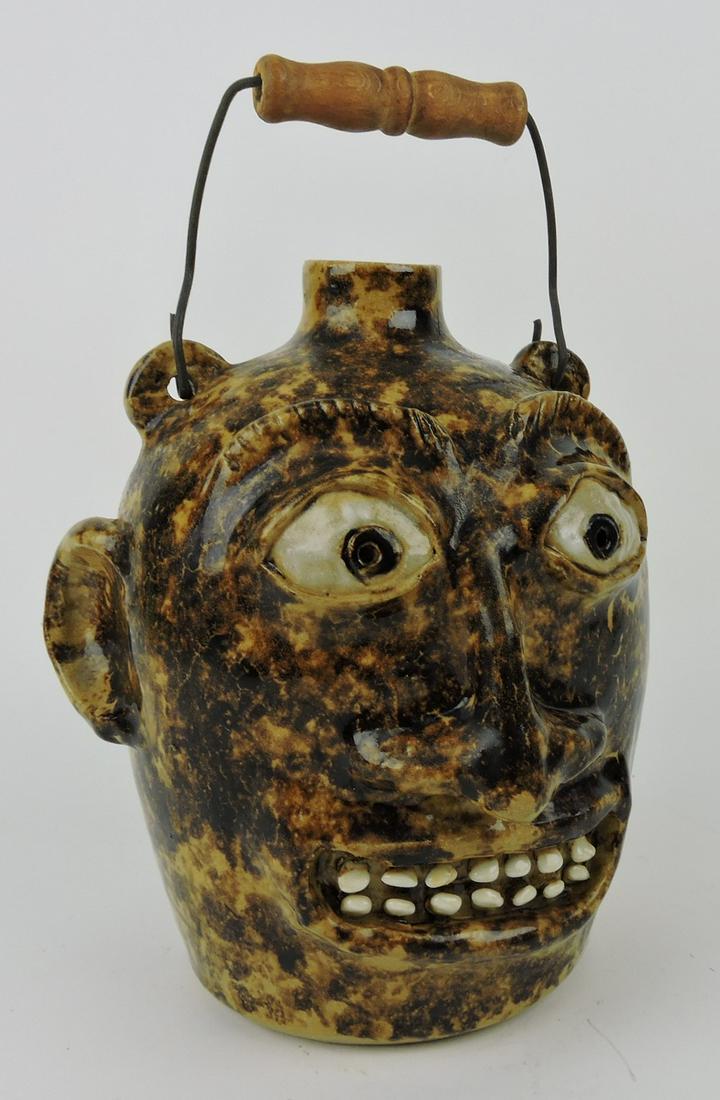North Carolina style stoneware face jug with (1 of 3)