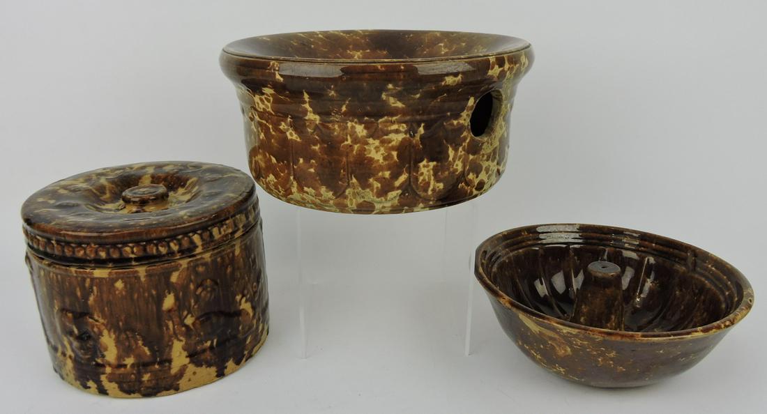 Rockingham and Bennington lot of 3: pieces: covered jar, spittoon, and mold