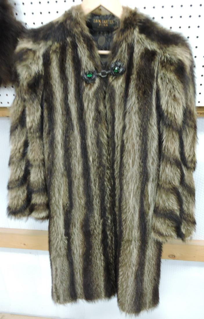 E.M. Carter Furs racoon coat: .
