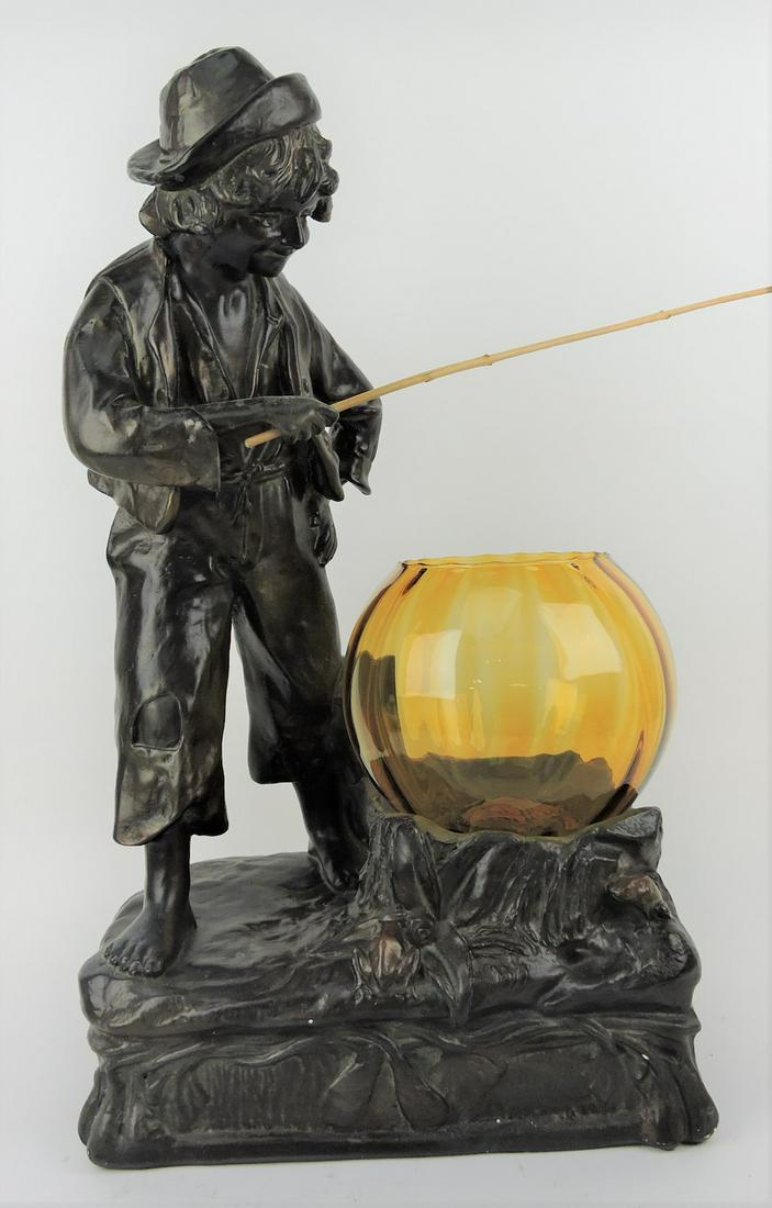 Chalkware sculpture of boy fishing with (1 of 1)