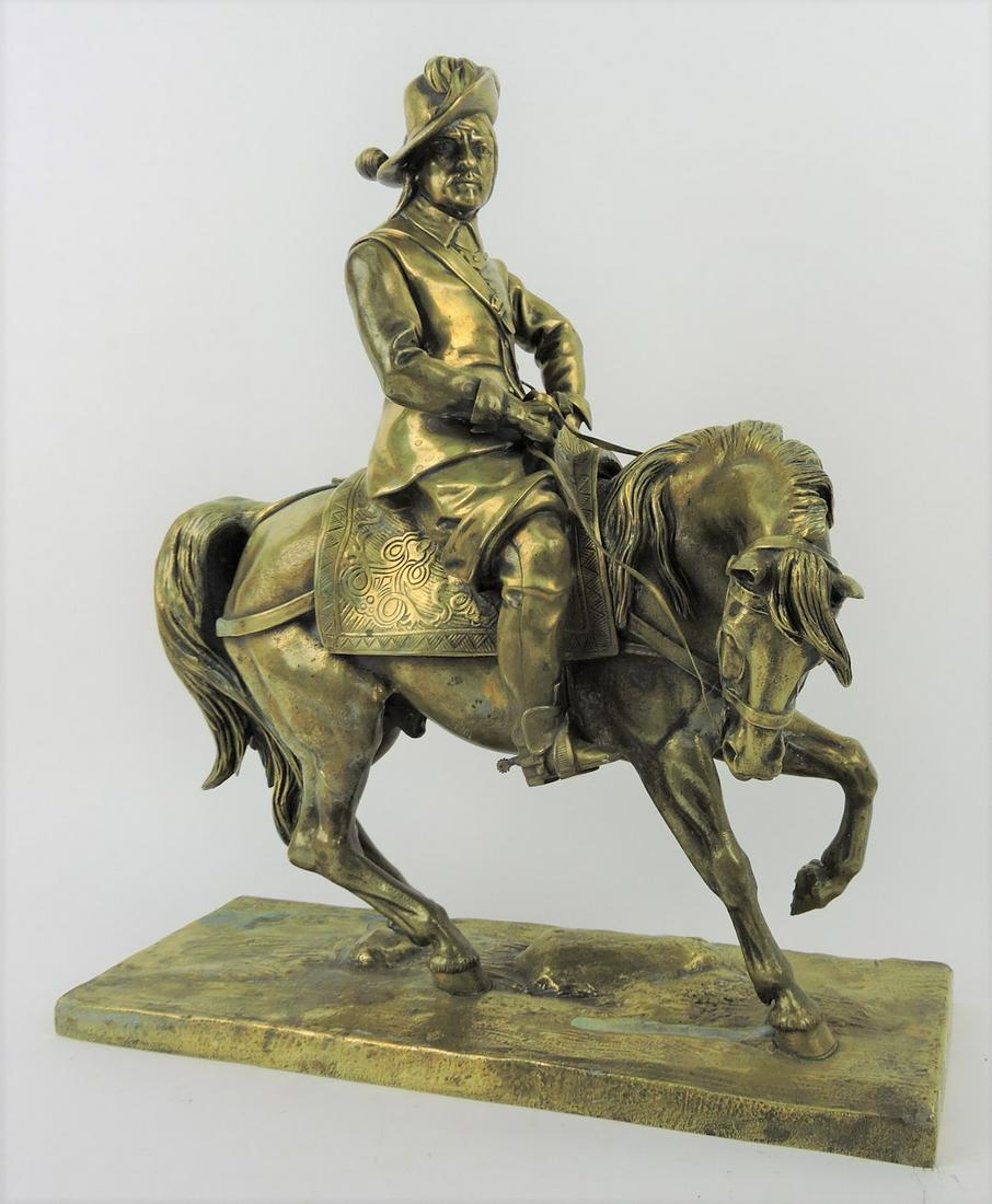 Bronze sculpture of man on horse, (1 of 2)