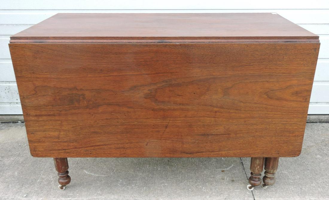Walnut drop leaf table, 47": .