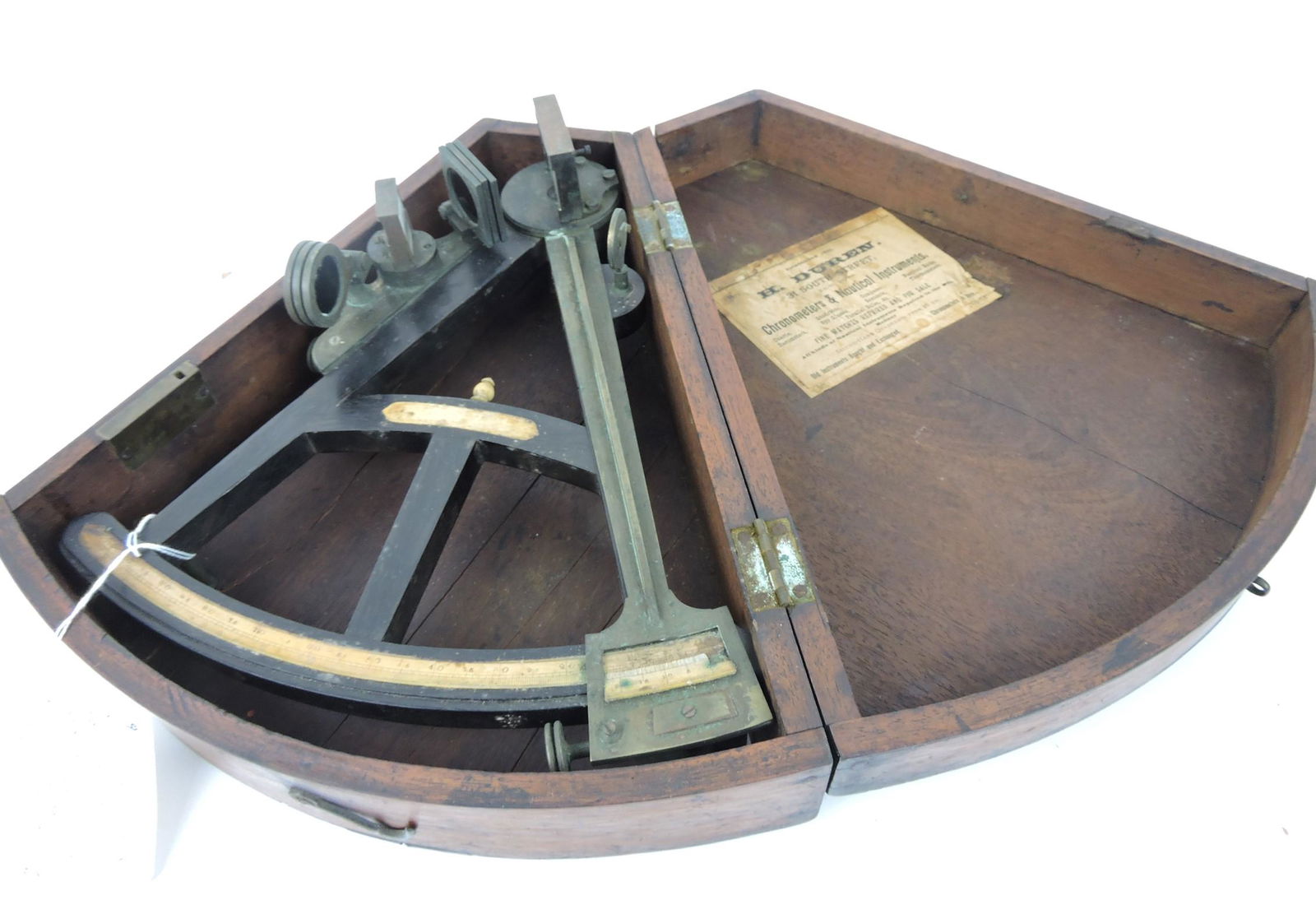 H. Duren brass and ebony sextant,: used to measure height of sun or star over horizon, with wooden case