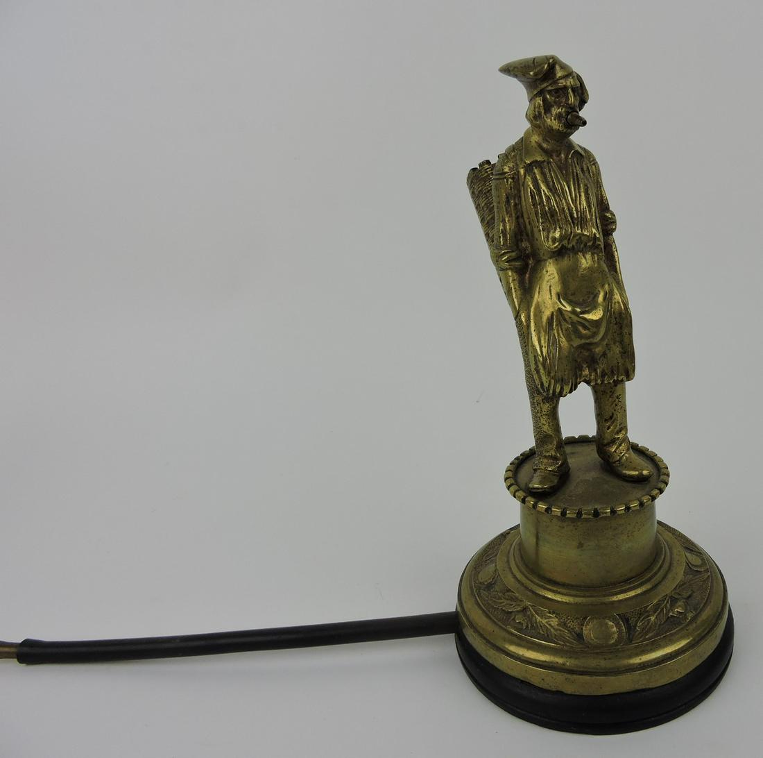 Brass figural opium pipe of man, (1 of 1)