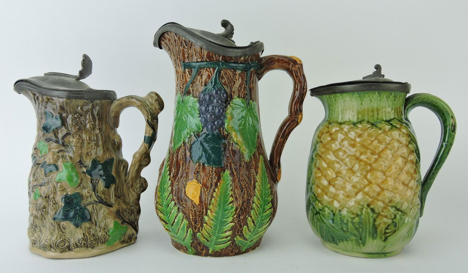 Majolica lot of 3 pewter topped syrup: pitchers, various condition