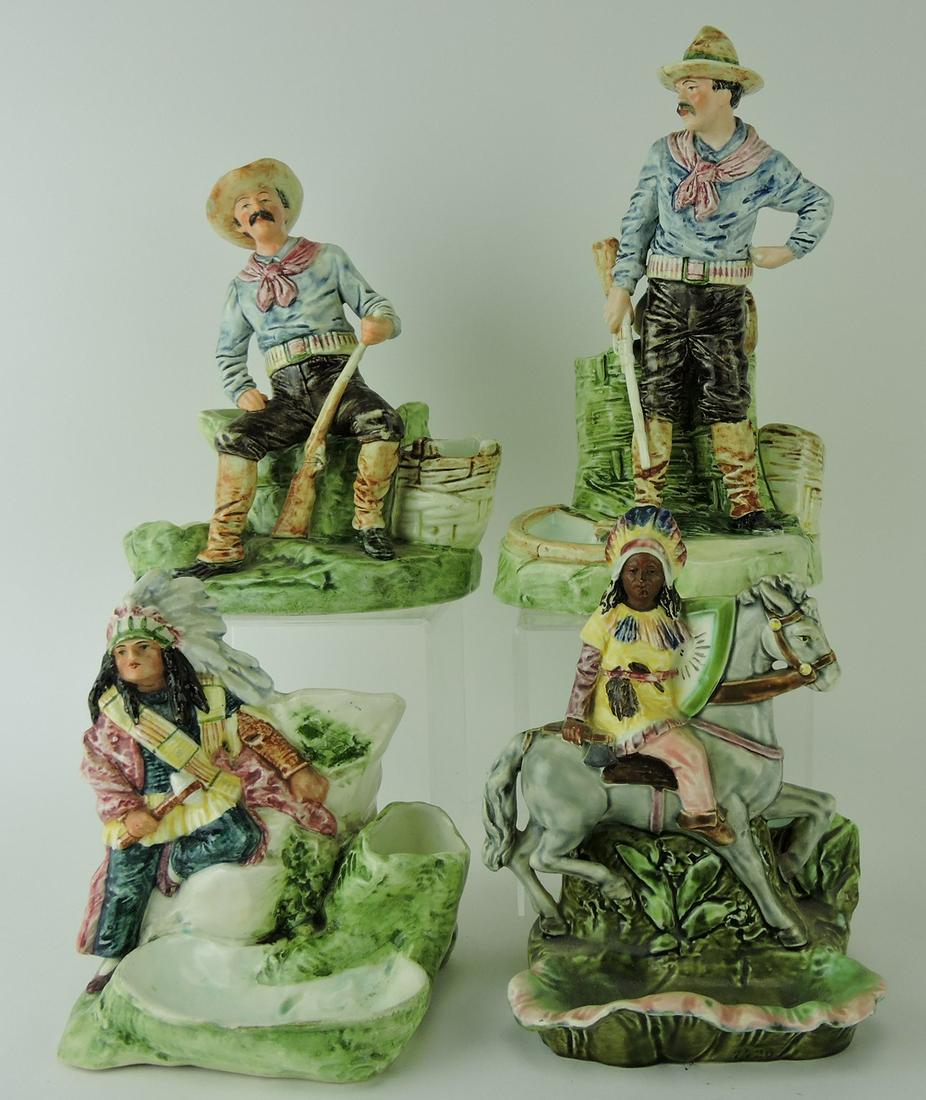 Majolica lot of 4 figural match strikers: of cowboys and Indians, various condition