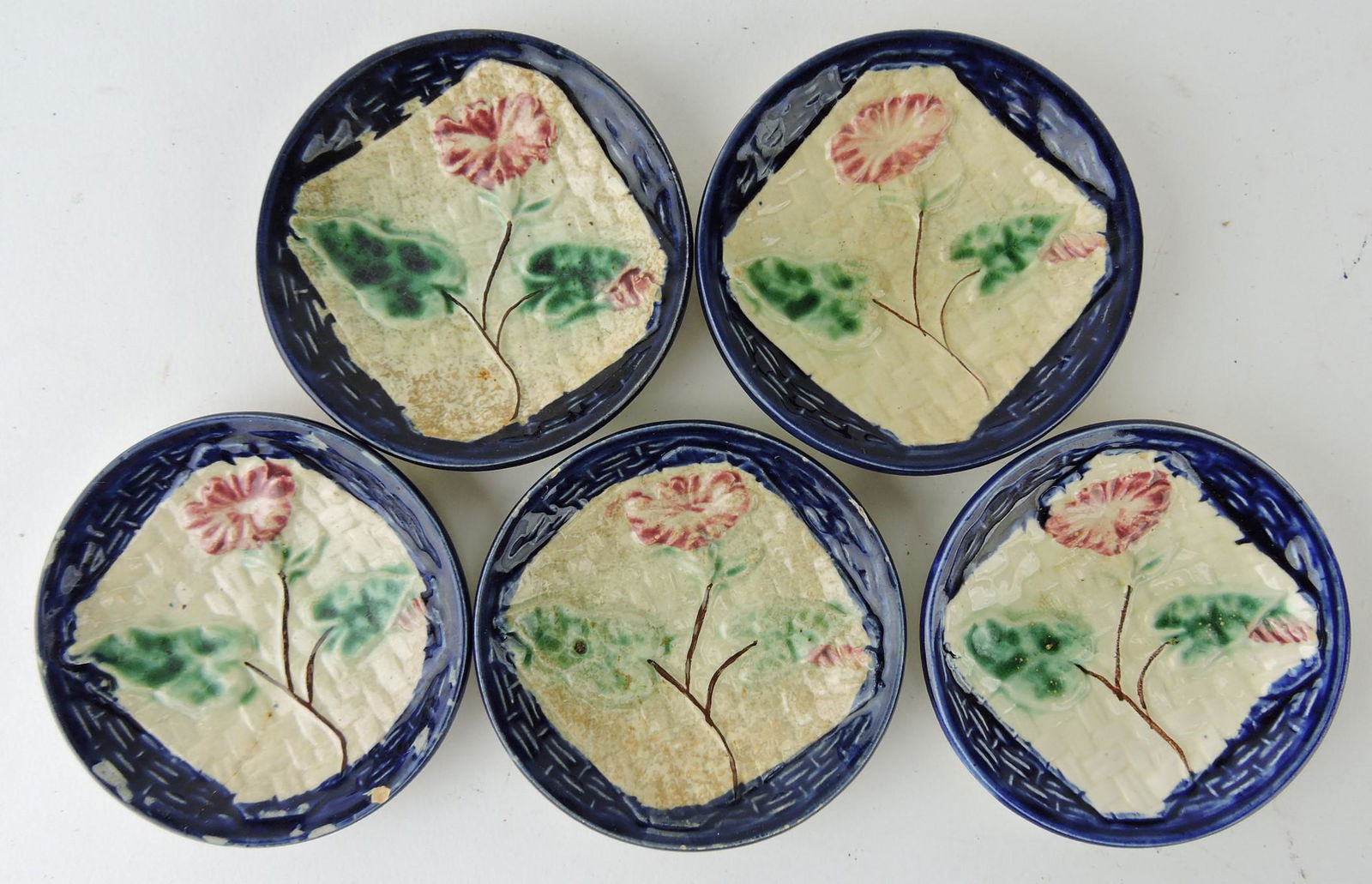Majolica lot of 5 morning glory and: napkin butter pats, various condition