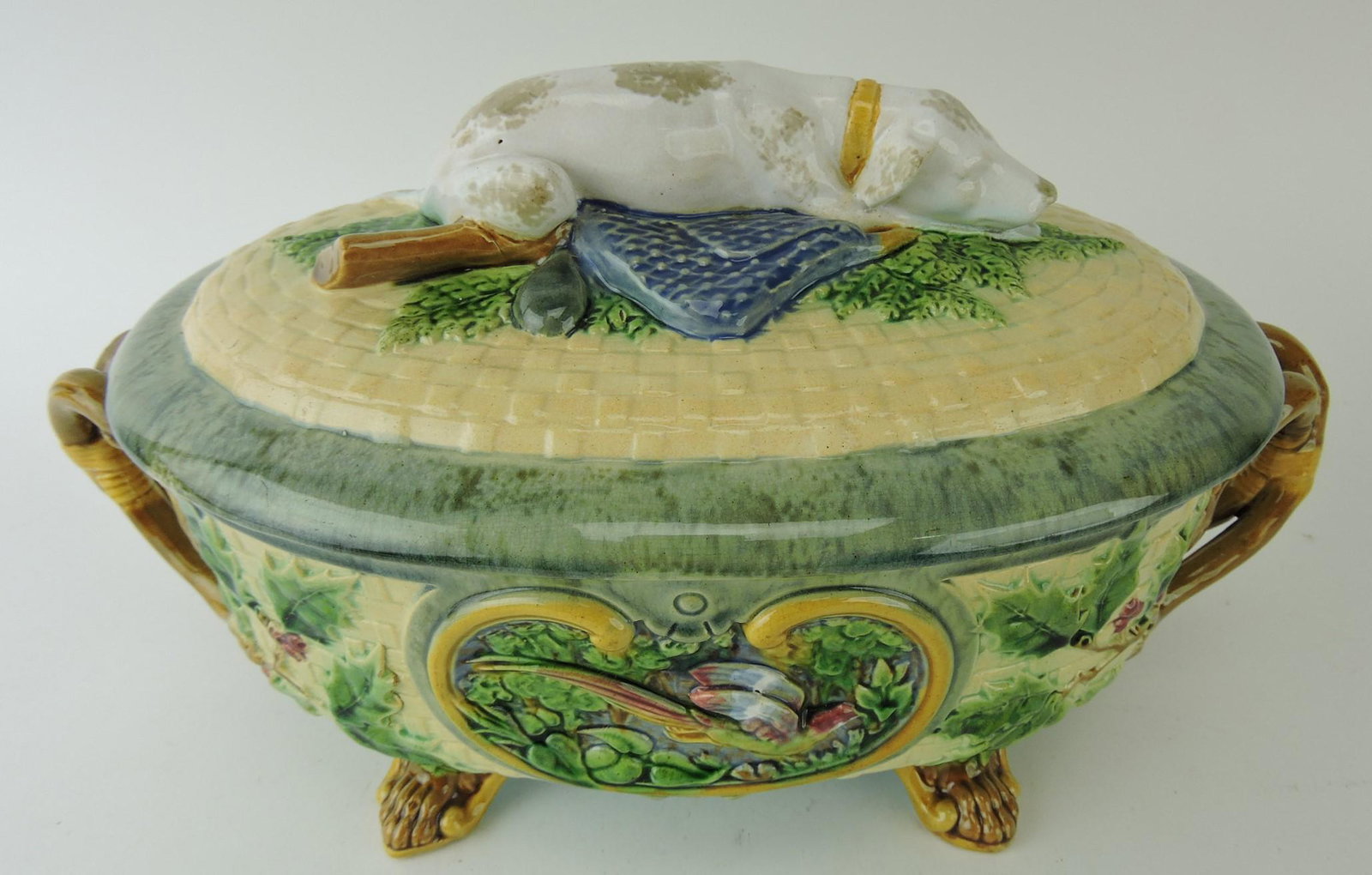 Minton majolica "gun dog" game dish: with hunting dog on cover, rim chip and hairline to base, 13"