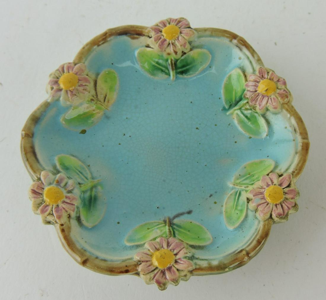 George Jones majolica turquoise: butter pat with flower blossom