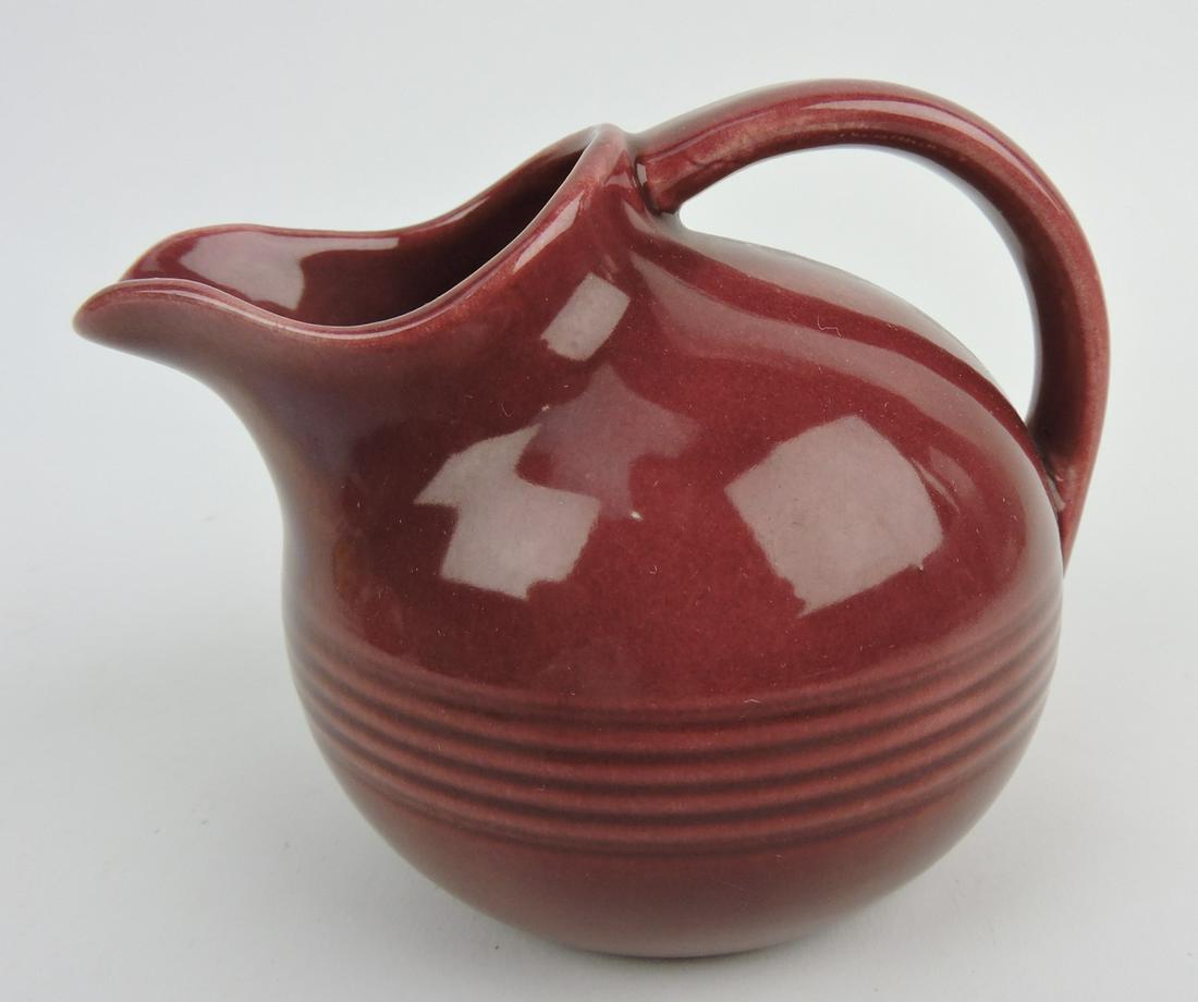 Fiesta Harlequin novelty creamer,: maroon