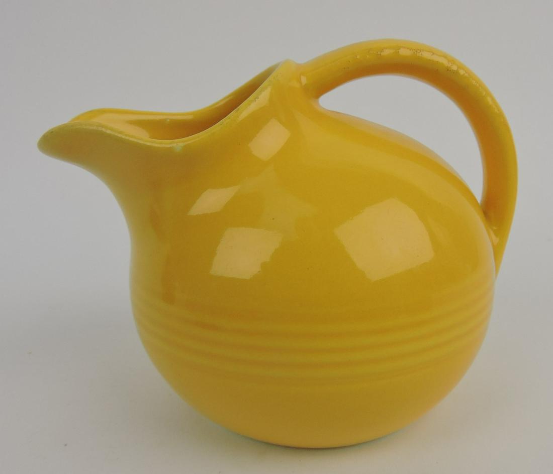 Fiesta Harlequin novelty creamer,: yellow