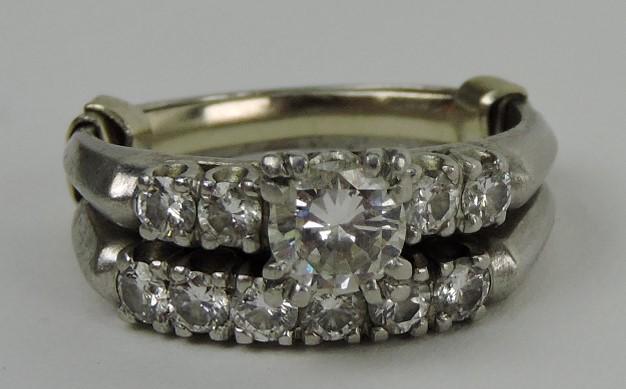 Platinum lady's diamond wedding set: with .45ct center diamons VVVS-2 clarity, H color and 5 - .05ct diamonds that are VVS in clarity and F-G color together with a platinum wedding ring with 6 - .06ct diamonds that are VS in clarity and