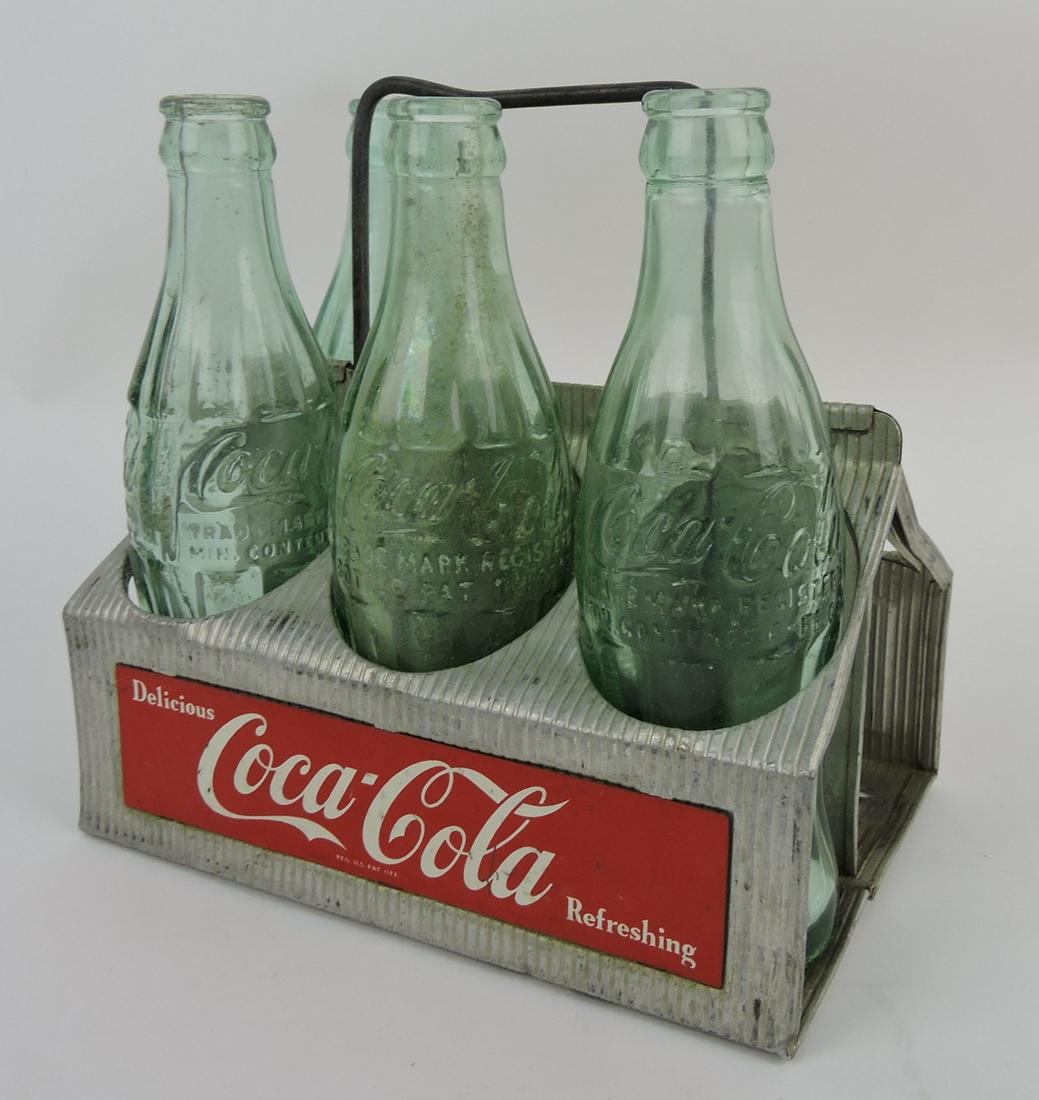 Coca Cola aluminum 6 pack bottle: carrier and 4 bottles (2 - Grand Rapids MI, Pontiac MI, LaPorte, IN)