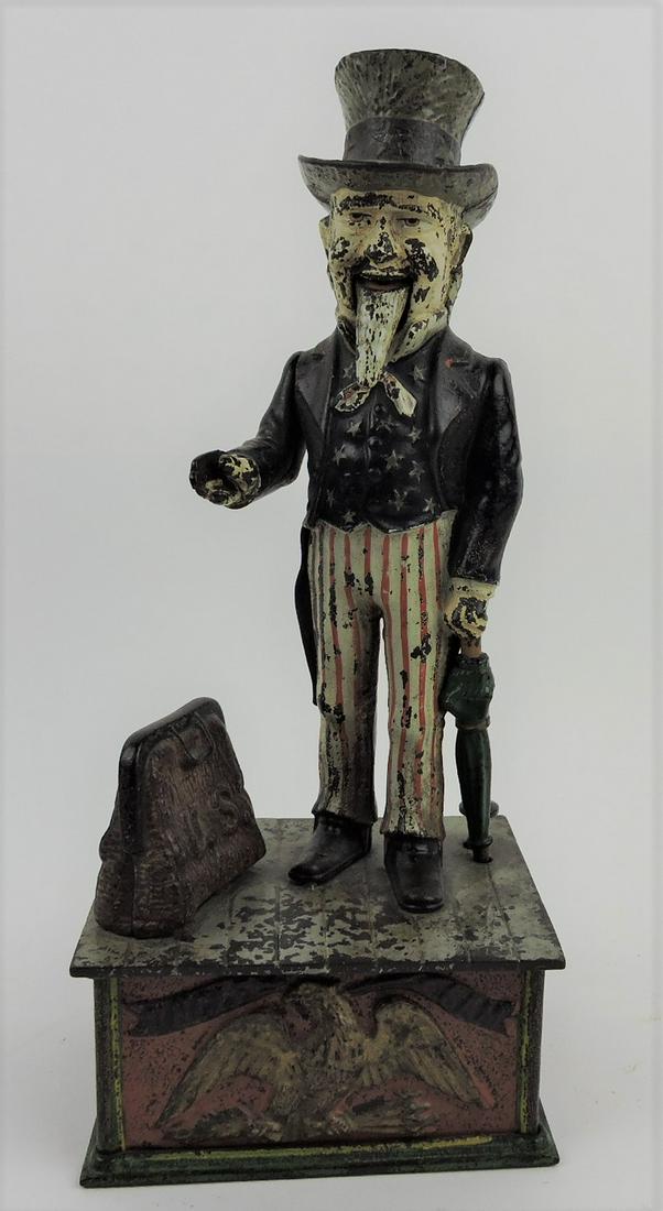 Uncle Sam cast iron mechanical: bank by Shepard Hardware, 11 1/2"