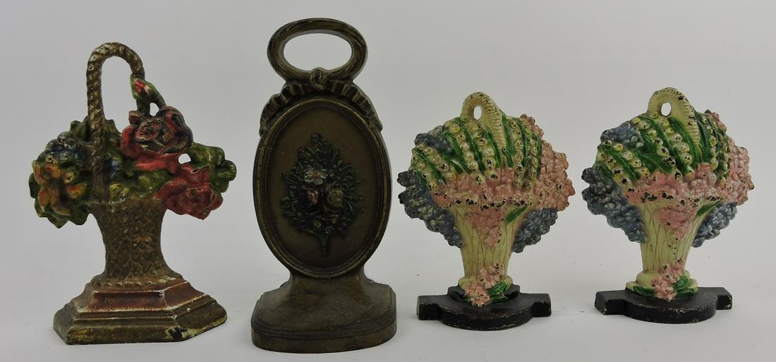 Cast iron lot of 4 door stops/bookends: .